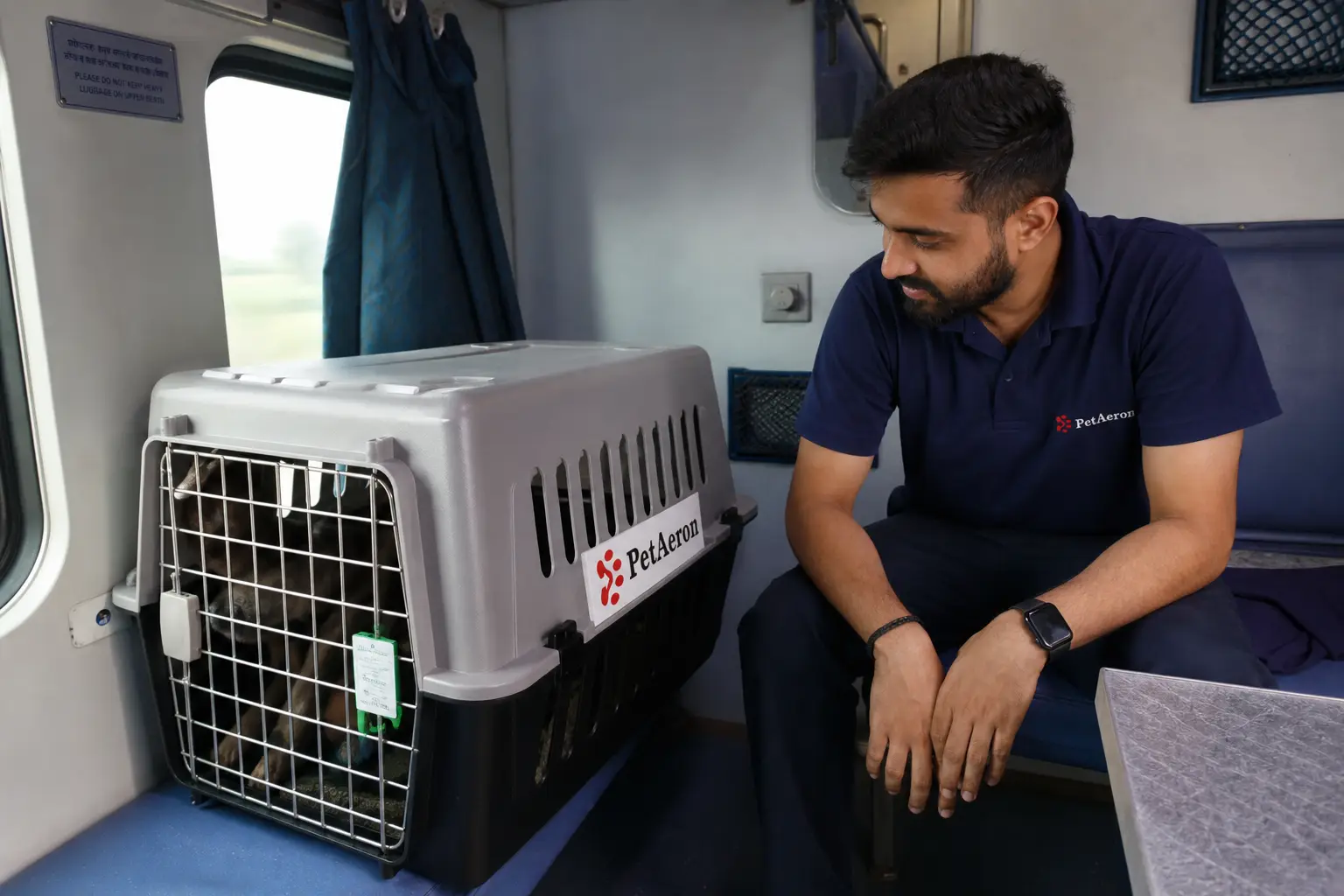 Pet and IATA crate on Indian Railways First AC train feeder to departure hub for Turkey flight